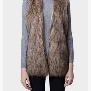 Barneys NY Faux Fur Reversible Vest. Warm and soft. Host pick! Best in show.